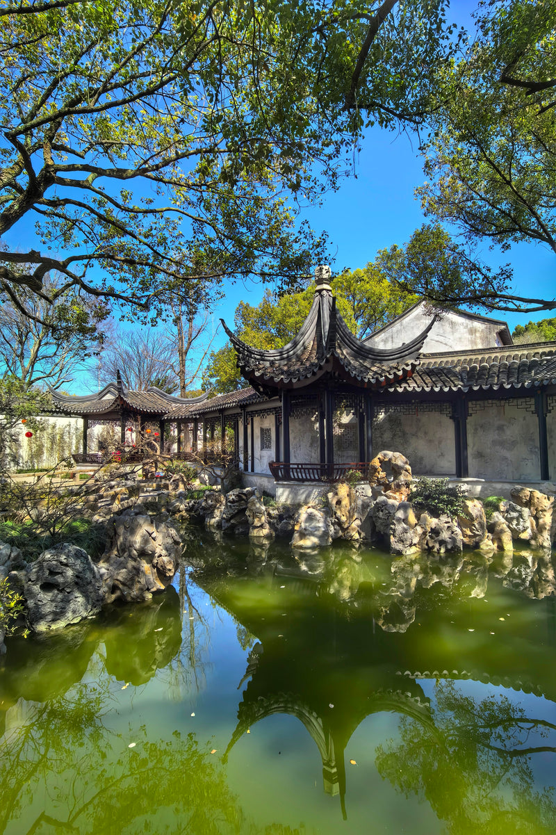 Water Town Serenity: Tongli Day Tour with UNESCO Gardens, Boat Ride & Pingtan Teahouse